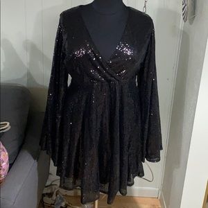 Little black sequined dress.